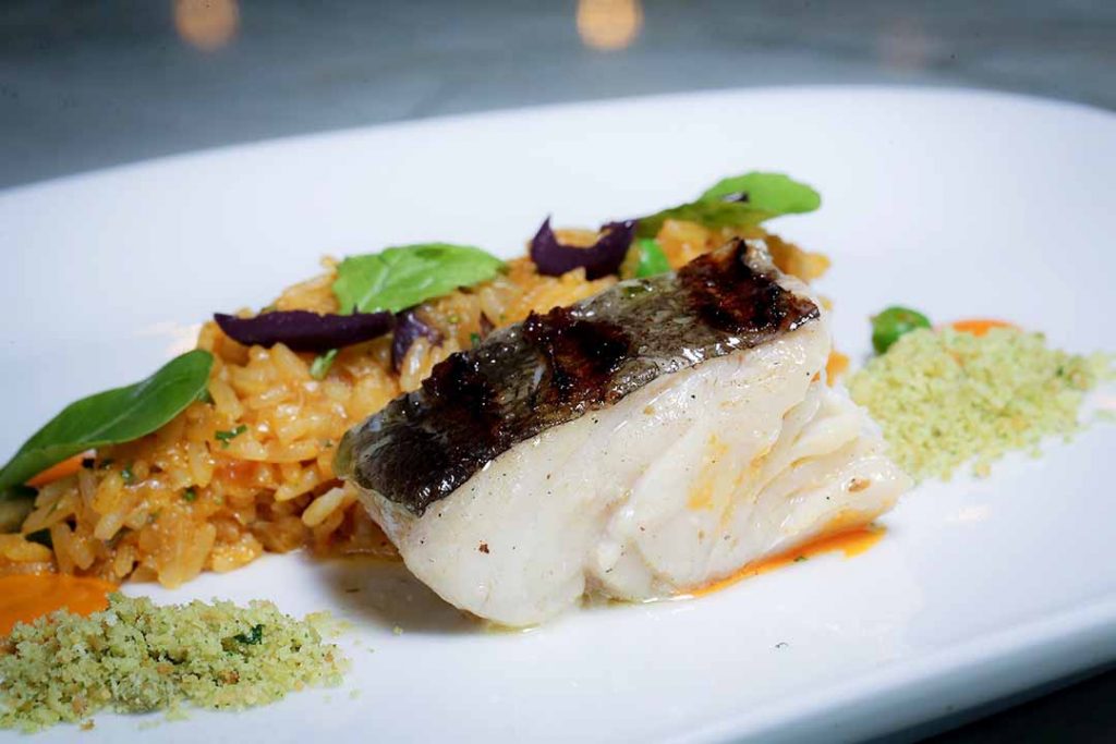 Arroz de Bacalhau com bacalhau na brasa. Foto: Inove Aceleradora