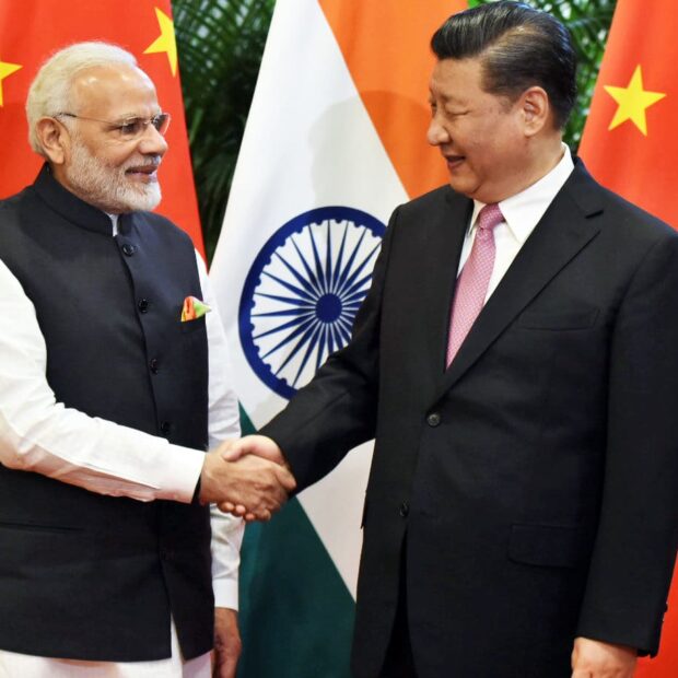 chinese president xi jinping shakes hands with indian prime minister narendra modi during their visit at east lake guest house, in wuhan
