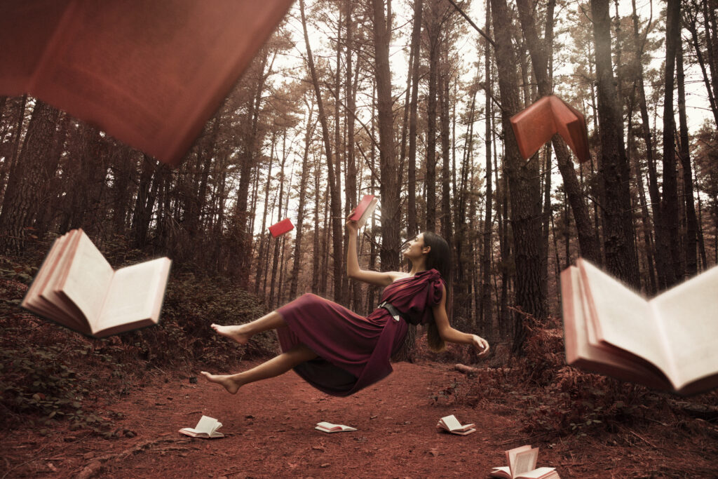 long shot woman reading forest