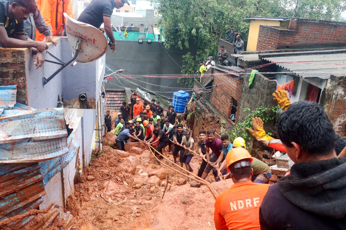 india weather cyclone landslide