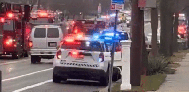 policia cerca escola em madison apos tiroteio 1734371387886 v2 615x300