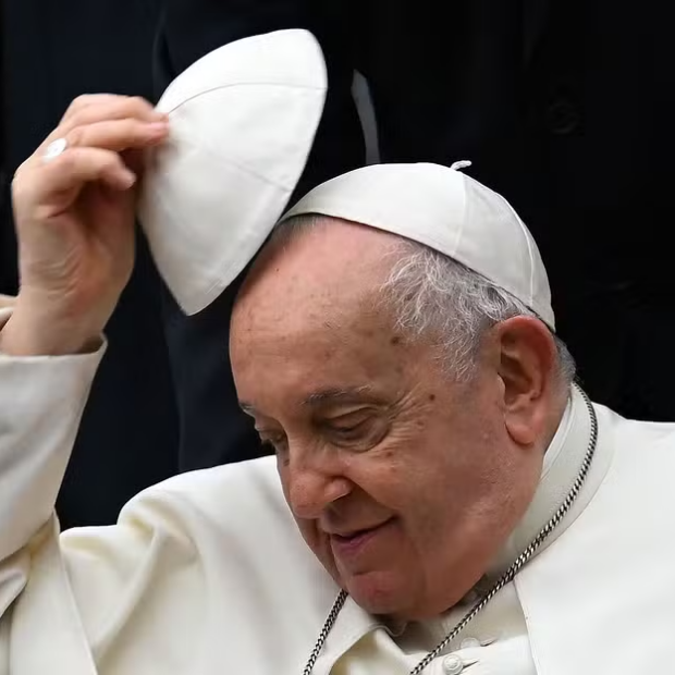 105428124 pope francis swaps his skull cap during the weekly general audience in paul vi hall at