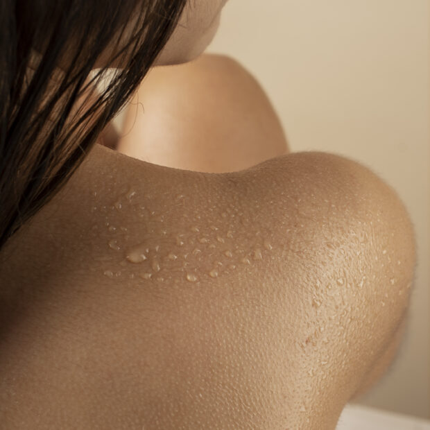 high angle woman with hydrated skin pele