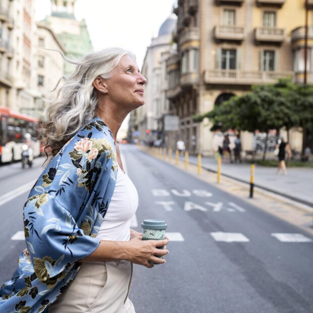 beautiful mature woman spending time around city