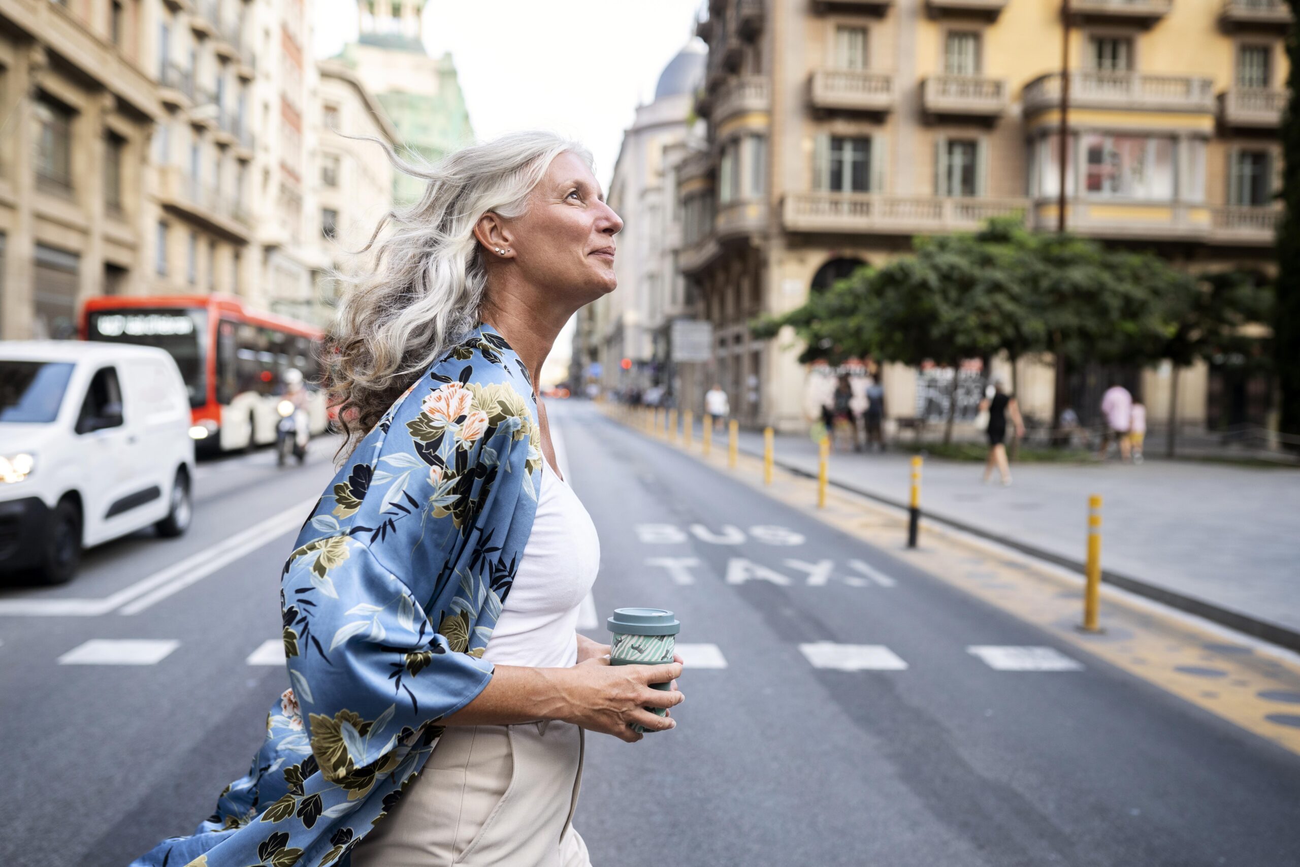 beautiful mature woman spending time around city