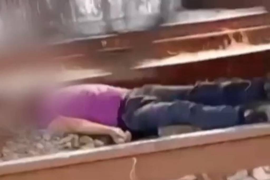 homem deita em trilho da cptm e espera trem passar sobre ele em vídeo para redes sociais
