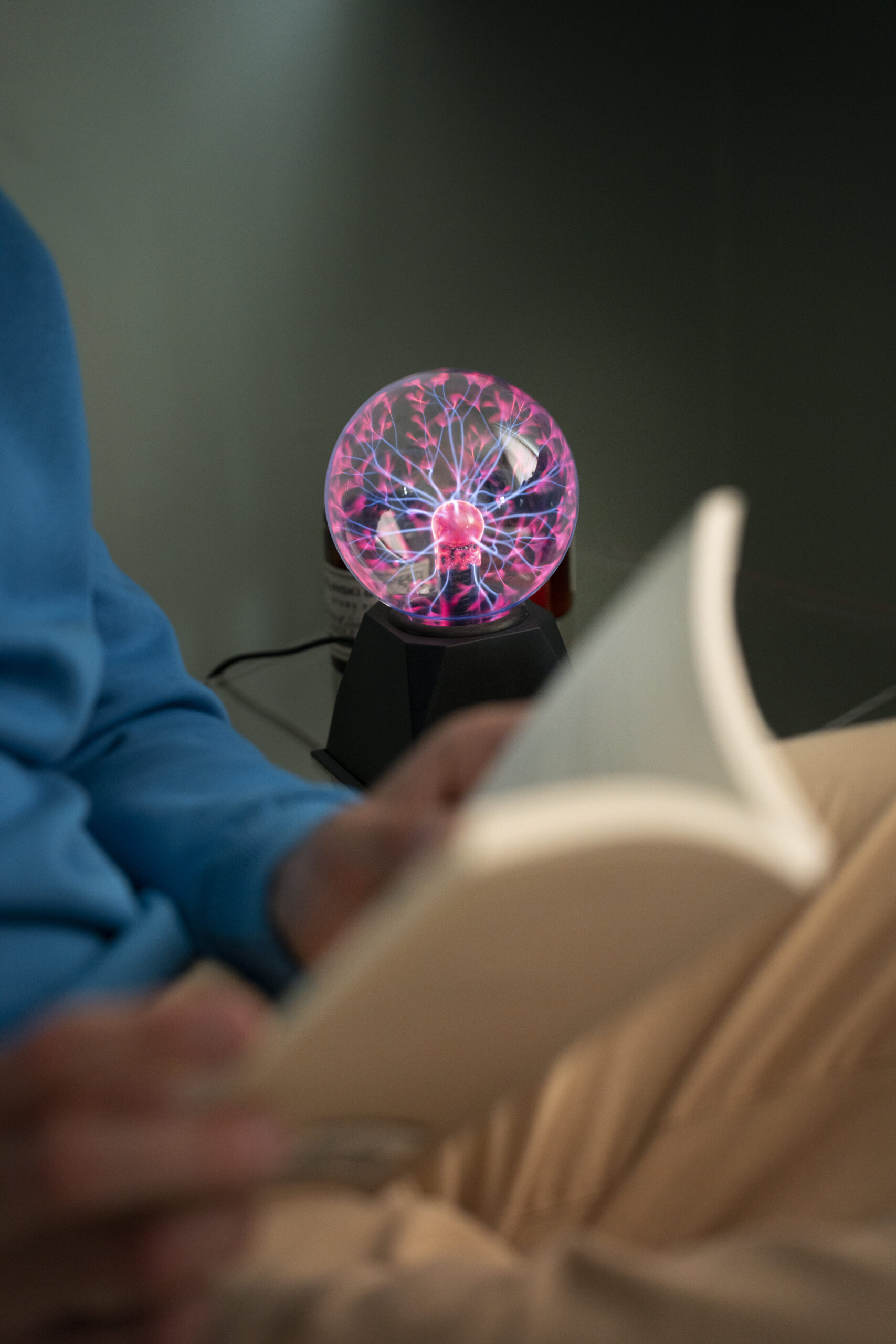 side view man with plasma ball