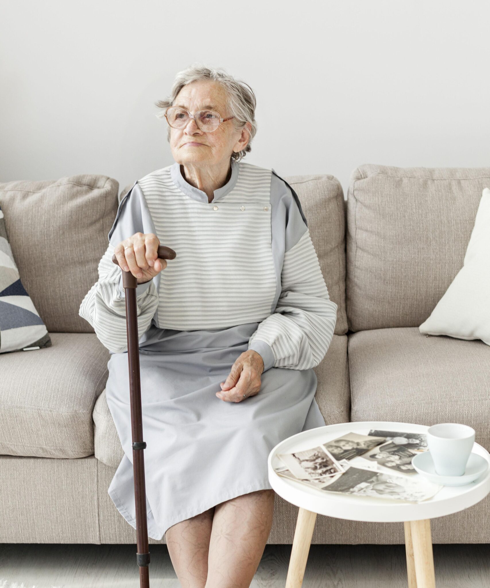 portrait elderly grandmother sitting sofa