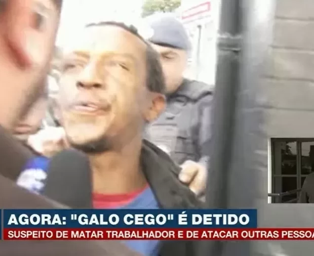 Jornalista Rafael Batalha foi agredido enquanto fazia perguntas a Michael Costa da Silva, conhecido como “Galo Cego”, detido por ataques violentos na zona oeste