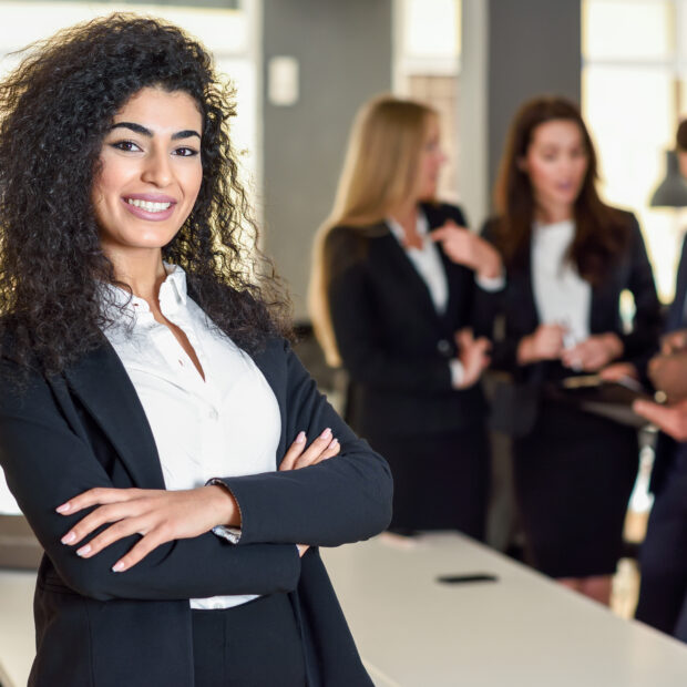 businesswoman leader in modern office with businesspeople workin