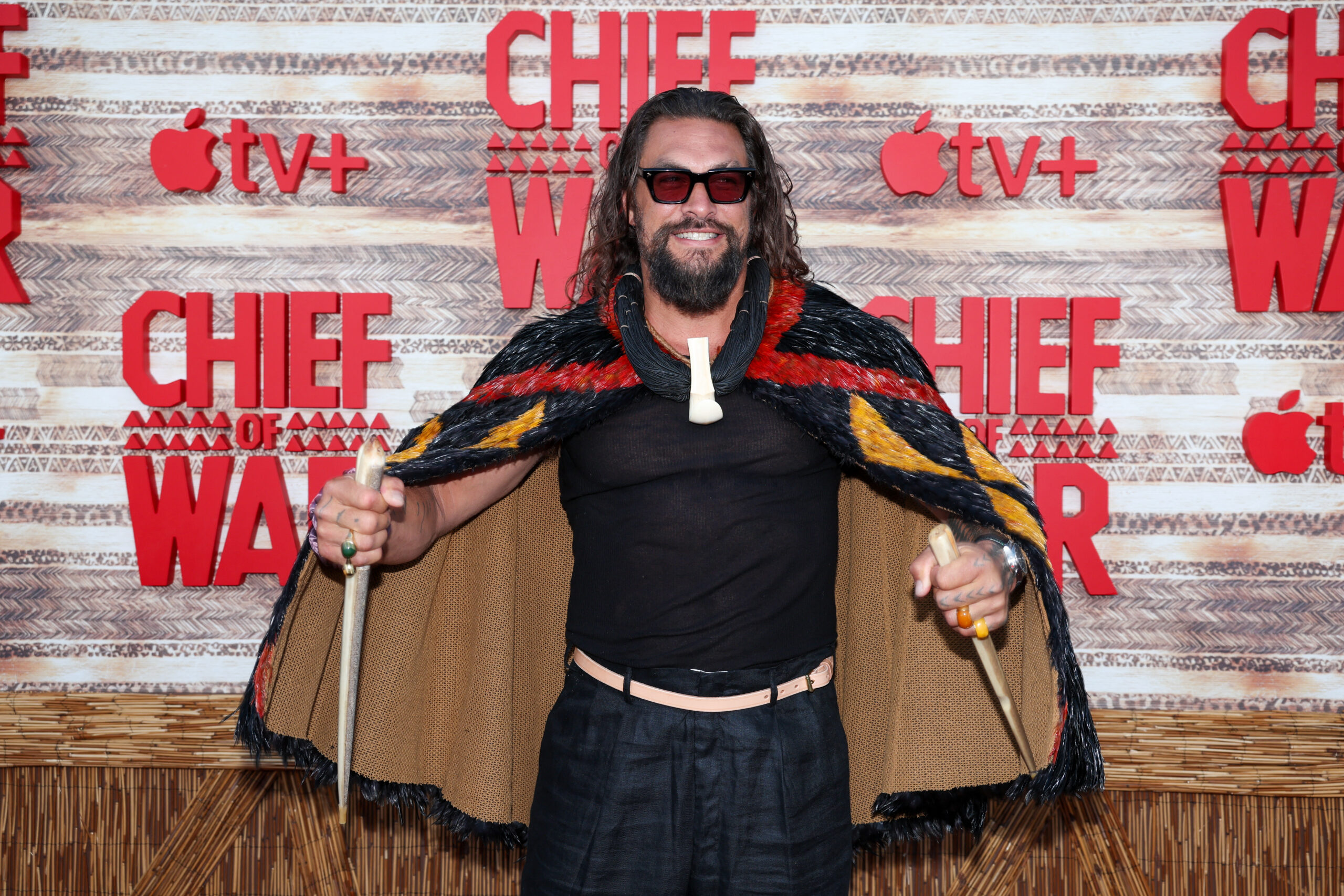 apple tv+ hosts premiere for new show "chief of war" with jason momoa