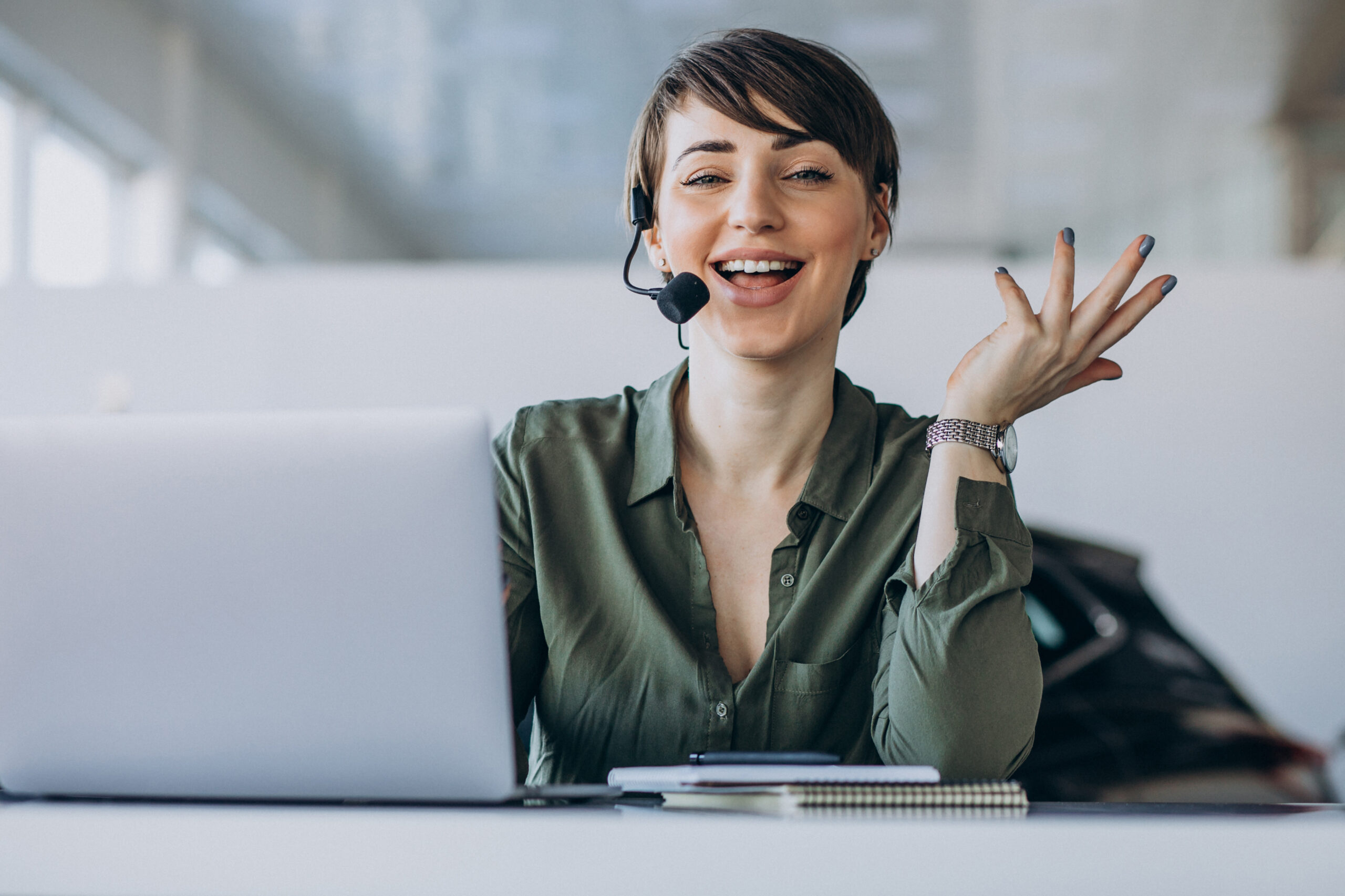 young woman with microphone in studio