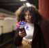 medium shot woman holding smartphone