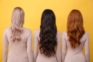 back view photo of young three ladies