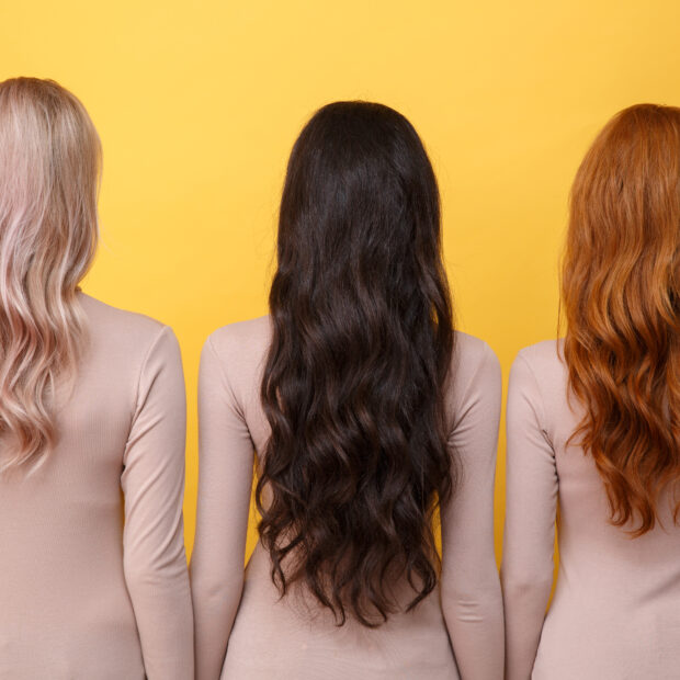 back view photo of young three ladies