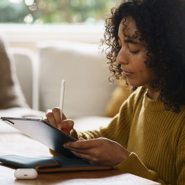 woman using digital tablet technology