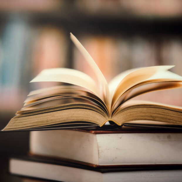 book in library with open textbook,education learning concept