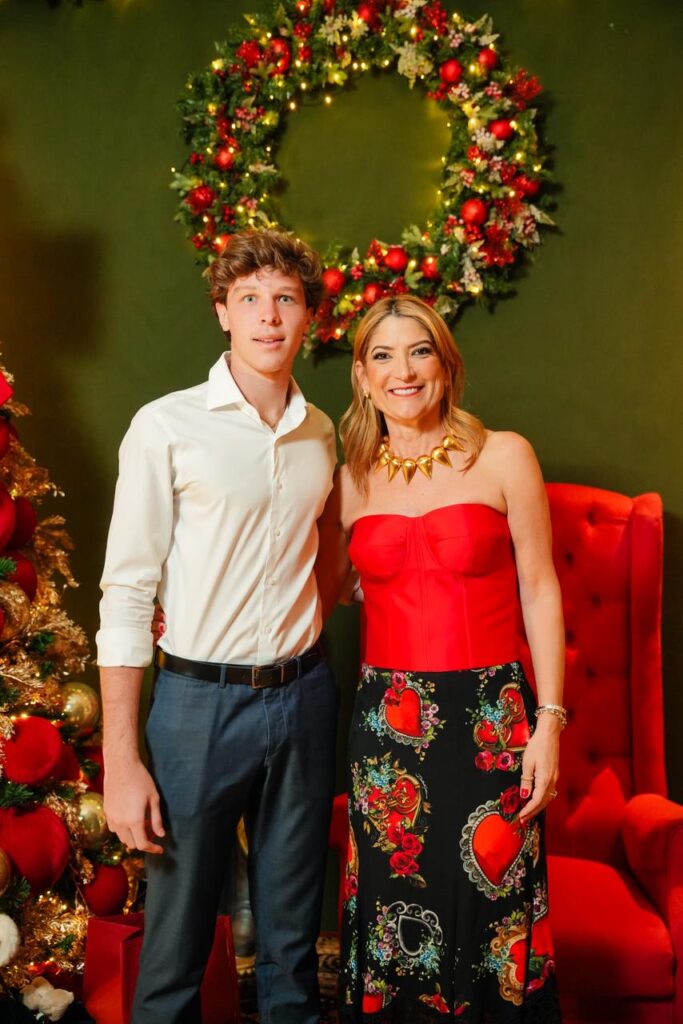 Matheus Manzon e a anfitriã Laura