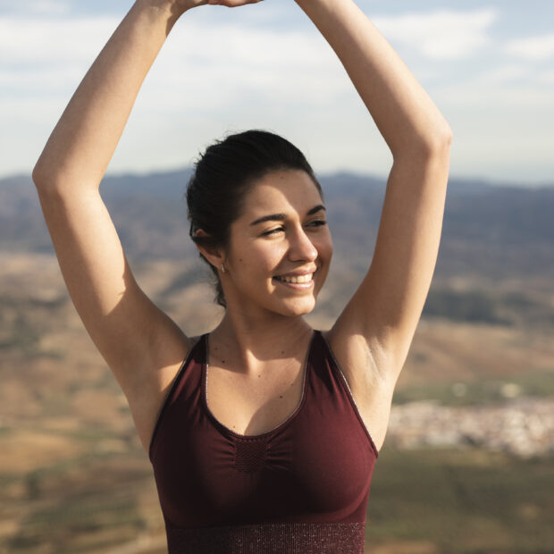 front view young smiley female yoga training