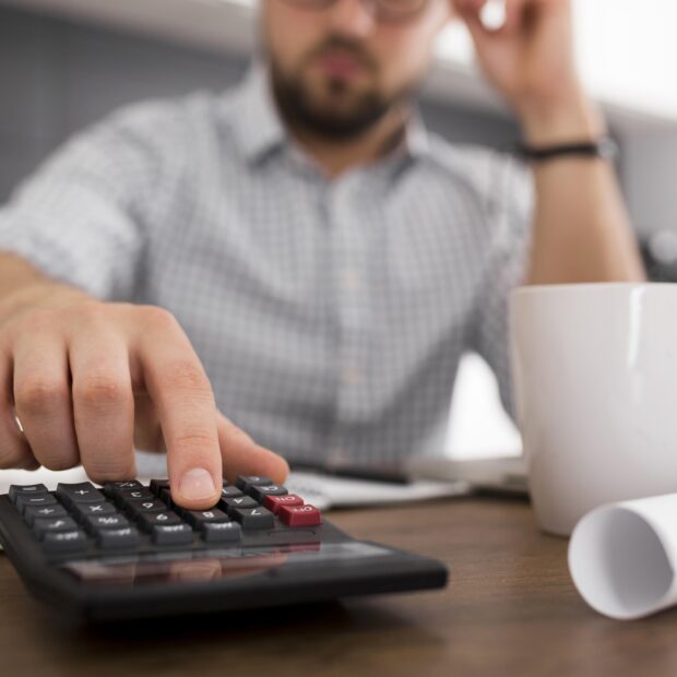 close up adult male working from home
