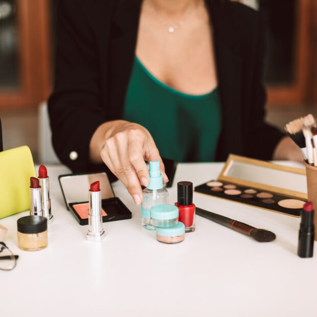 close up beauty blogger talking about cosmetic products isolated