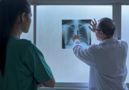 the doctor is analytic x ray film , showing to patient , health care concept