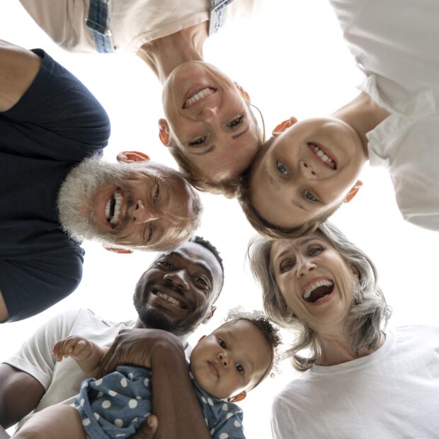 close up family members looking down