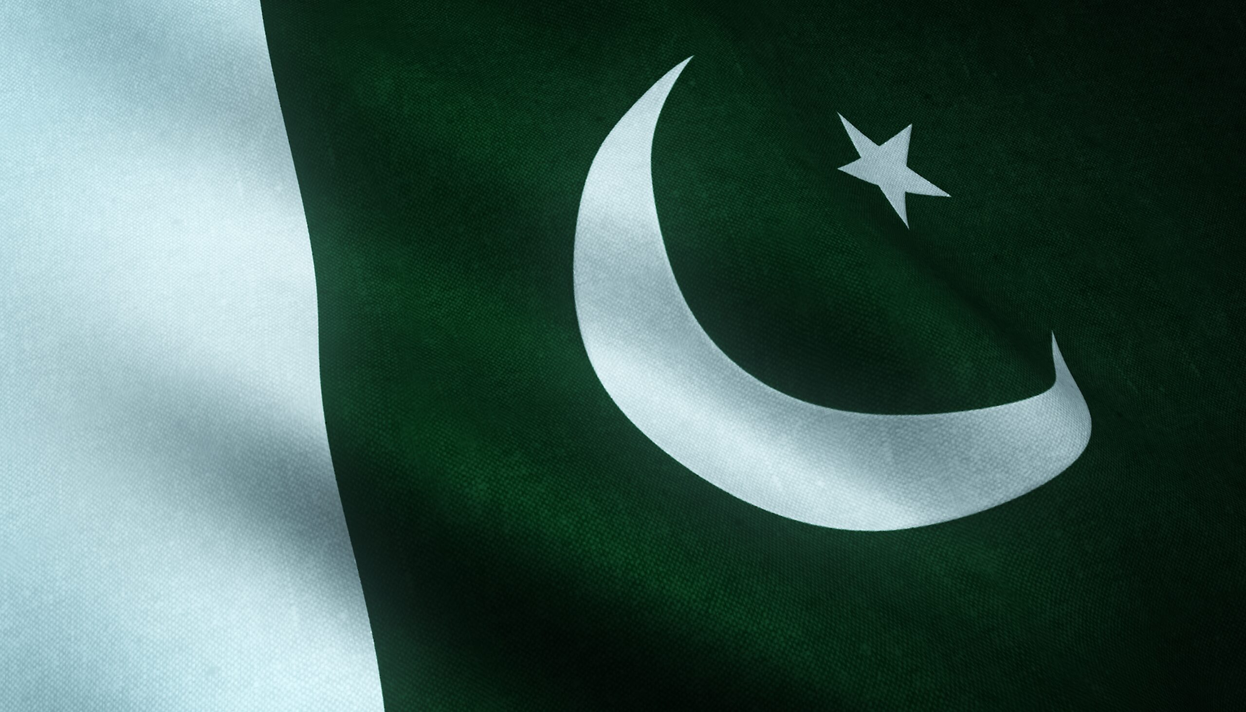 closeup shot of the waving flag of pakistan with interesting textures