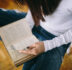 woman reading book