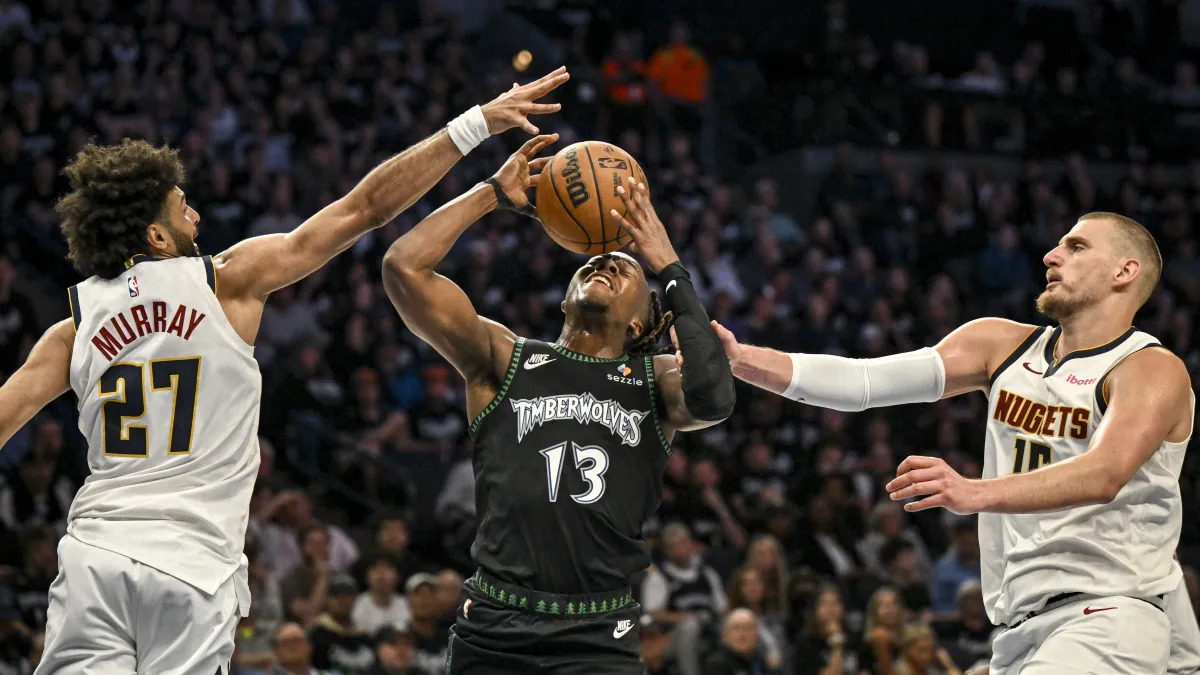 Ayo Dosunmu foi o nome da vitória dos Wolves contra os Nuggets • Photo by AAron Ontiveroz/The Denver Post