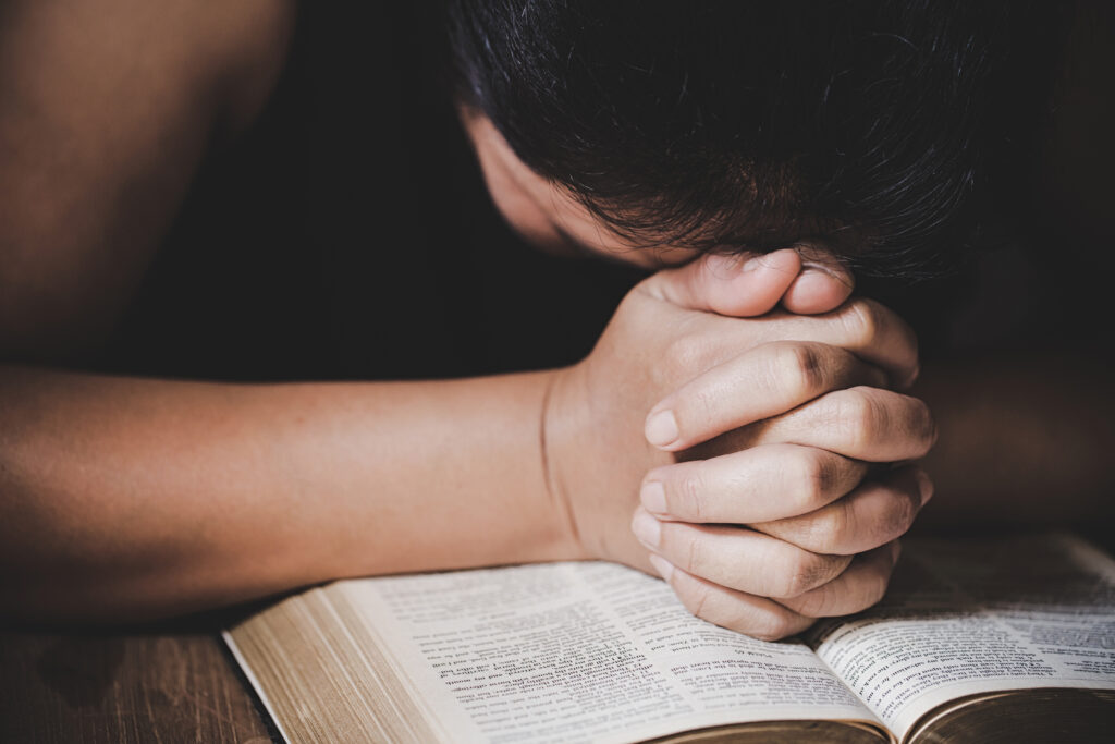 christian life crisis prayer to god. woman pray for god blessing
