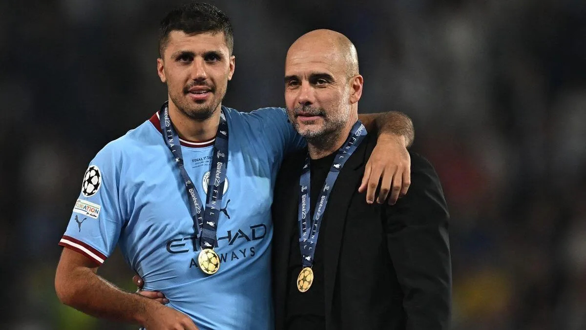 Rodri e Guardiola, do City • Paul Ellis/AFP