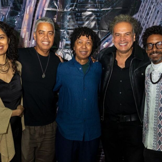 Com participações de BK e Melly, o grupo TRIVIA lançou seu primeiro álbum cercado de nomes importantes da música brasileira. - Reprodução