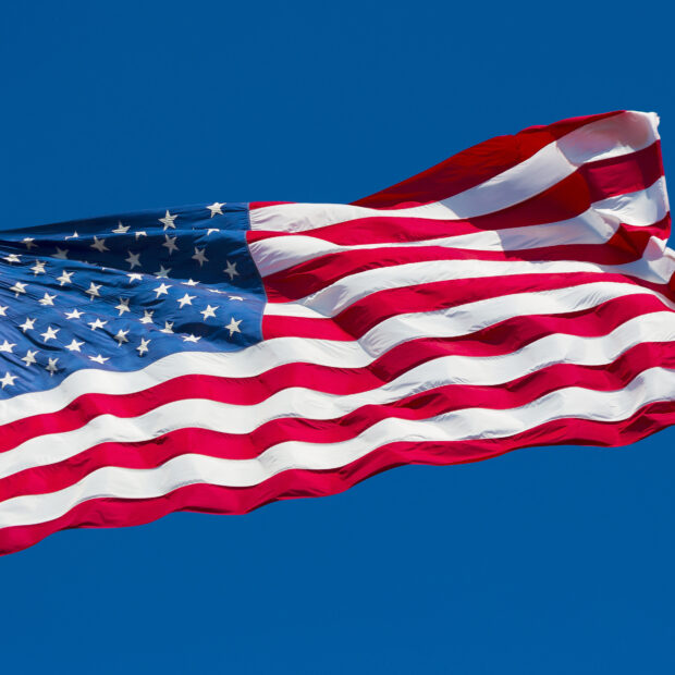american flag and blue sky
