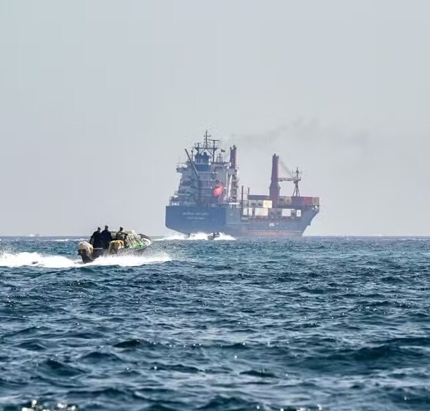 114357063 files a boat approaches the st kitts and nevis flagged container ship marsa victory while