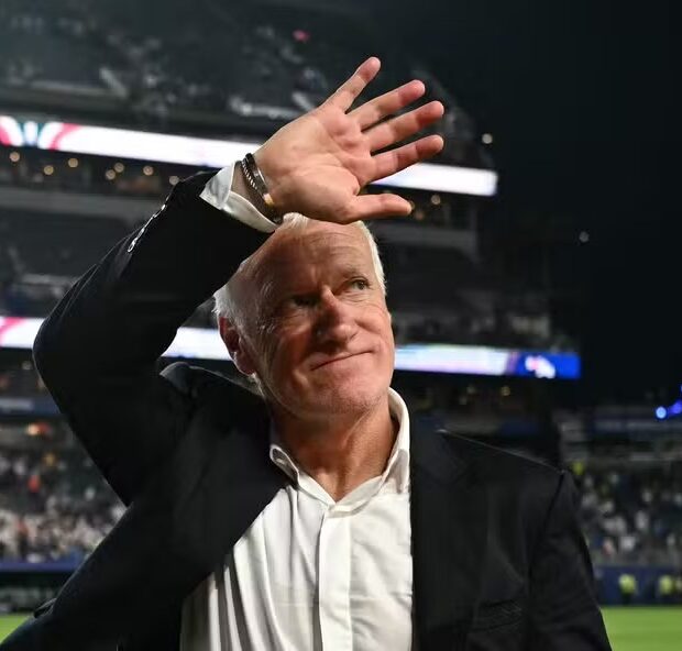 115392582 frances head coach didier deschamps waves to fans after winning the 2026 world cup group