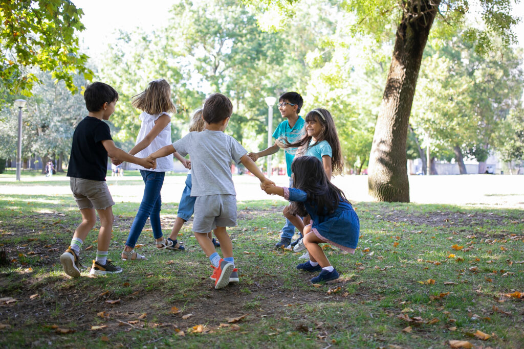 happy children playing together outdoors
