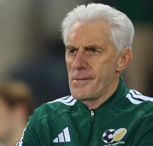 115090305 south africas belgian coach hugo broos looks on ahead of the international friendly footb