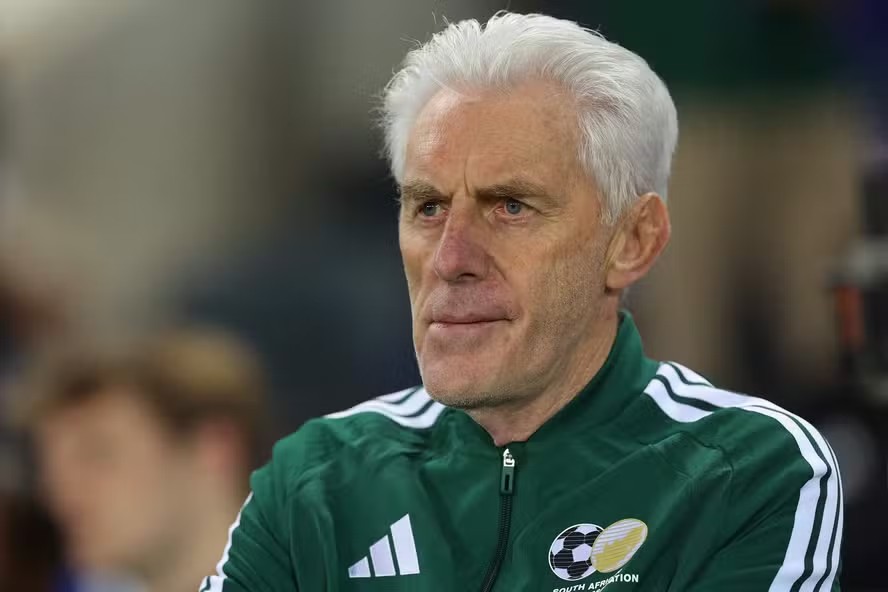 115090305 south africas belgian coach hugo broos looks on ahead of the international friendly footb