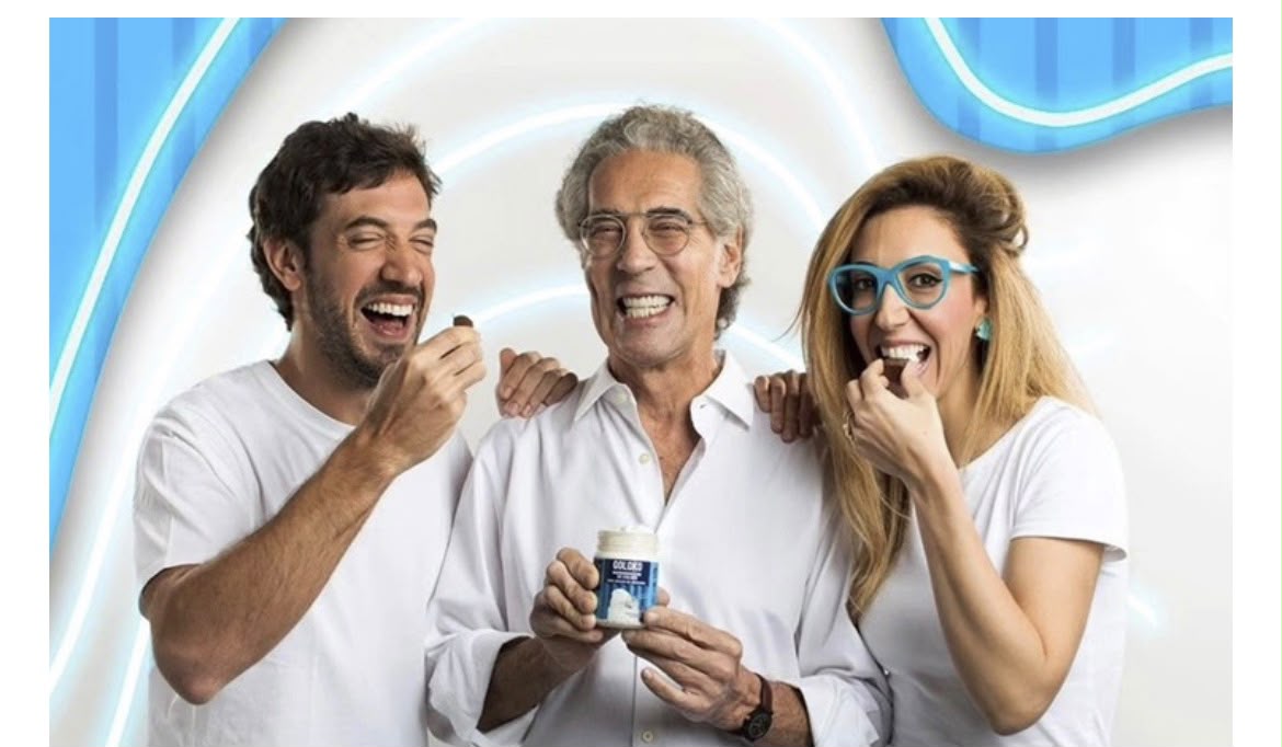 GoldKo lança novos cremes saudáveis e expande mercado de sobremesas O executivo Gregory Kopenhagen Goldfinger, CEO e cofundador da GoldKo, analisa a expansão de cremes sem açúcar nacional A fabricante de chocolates saudáveis GoldKo expandiu sua linha de potes com o lançamento dos cremes de pistache e amendoim sem adição de açúcares para todo o mercado nacional em 2026. Fundada pelos executivos Gregory Kopenhagen Goldfinger e Chaim Kopenhagen Goldfinger, a marca amplia sua presença na categoria de cremes de colher apostando na versatilidade de consumo e em fórmulas sem sabor residual de adoçantes. A novidade responde à crescente busca por opções equilibradas no varejo alimentar brasileiro, unindo inovação em sabores a produtos prontos para consumo puro ou como acompanhamento em receitas.