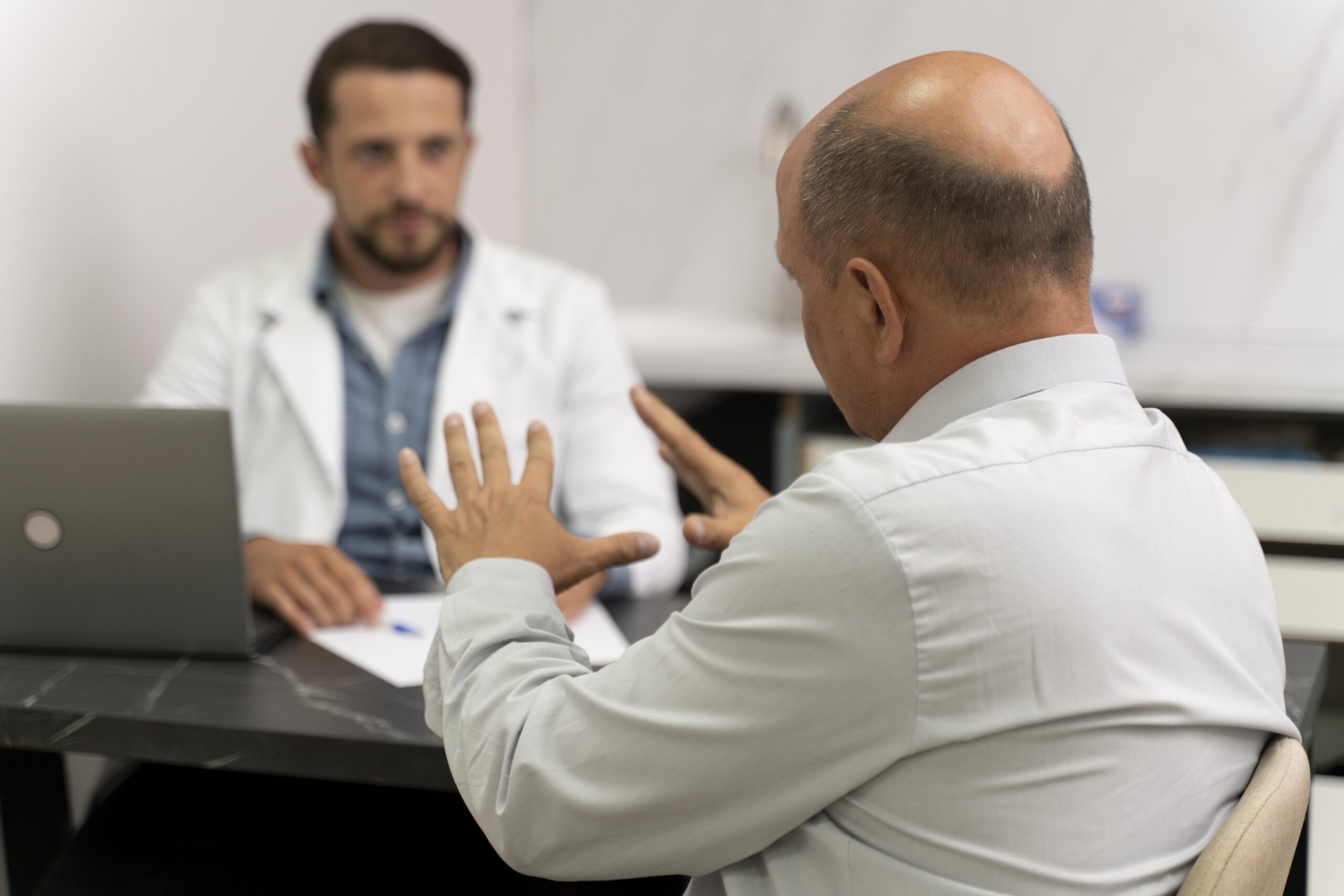 man going through follicular unit extraction process