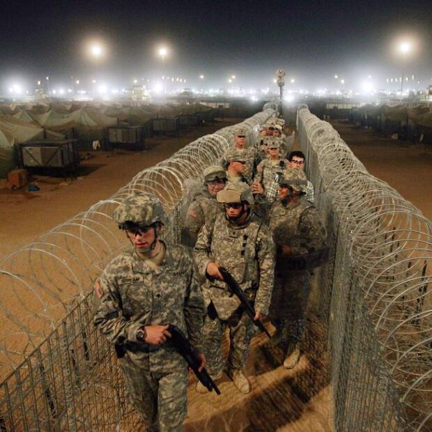 89508741 files in this file photo us army soldiers carry shotguns as they walk along a corridor
