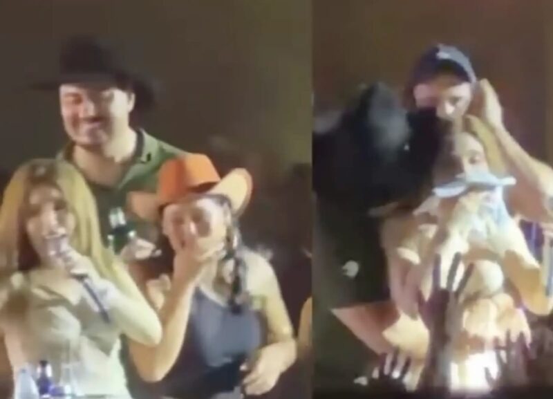  Vídeo mostra o momento em que o político abraça a cantora por trás no palco

